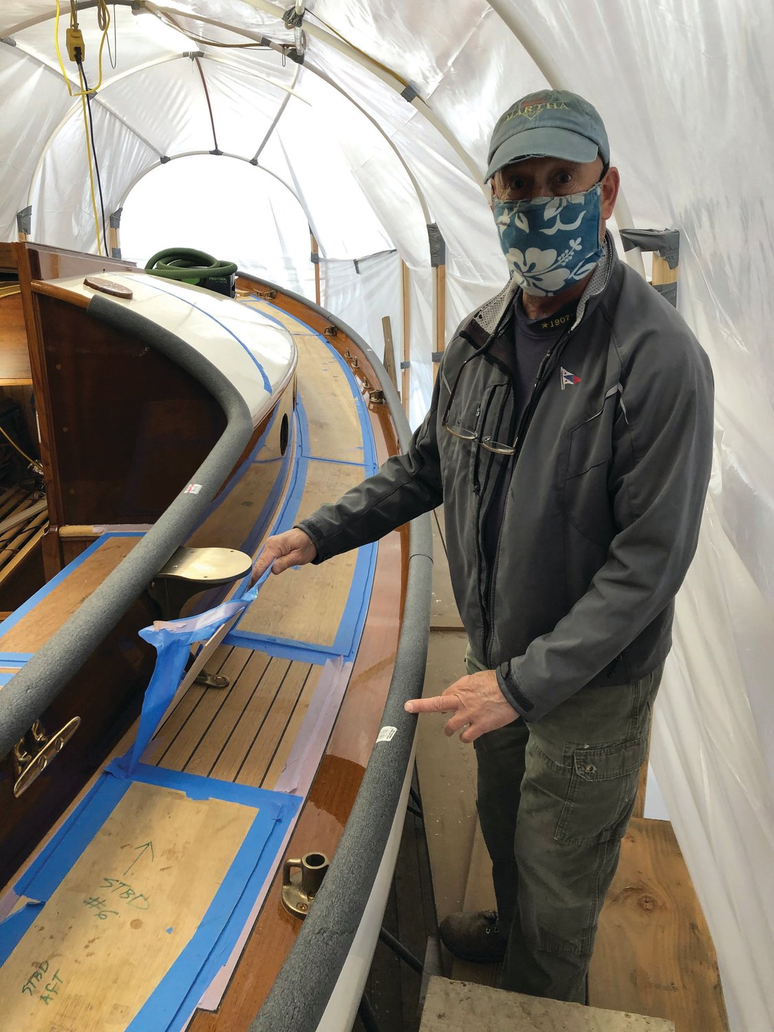 Robert d’Arcy, captain of the schooner Martha, overseeing a project for Robert d’Arcy Marine Services.